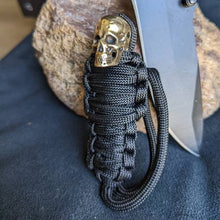 Load image into Gallery viewer, Paracord Keychain Mummy Brass Skull