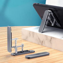 Load image into Gallery viewer, Ultra Thin Stick-On Adjustable Phone Stand