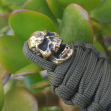 Load image into Gallery viewer, Paracord Keychain Mummy Brass Skull