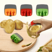 Load image into Gallery viewer, Two finger shaved fruit peeler